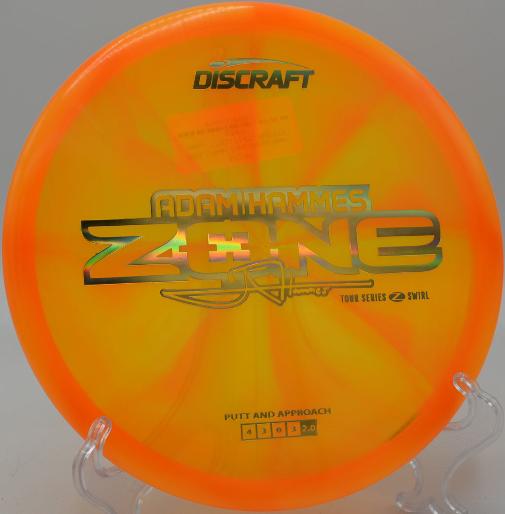 Z Swirl Zone flicked forehand toward a wooded green at Glenwood Disc Golf Course in Hattiesburg, Mississippi.

