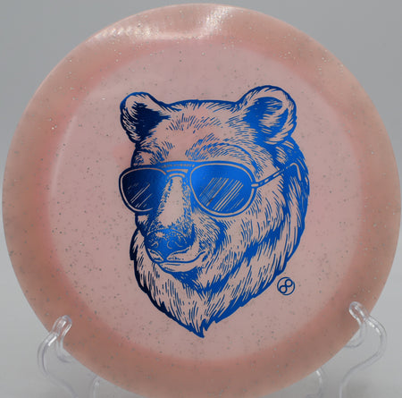 Metal Flake Glow C-Blend X-Out Pharaoh Infinite Discs bomber flying straight with reliable fade at Blue Ribbon Pines Disc Golf Course in East Bethel, Minnesota.