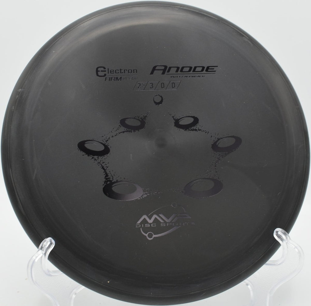 Electron Firm Anode putter resting near chains after a glidey upshot at Z-Boaz Park Disc Golf Course in Fort Worth, Texas
