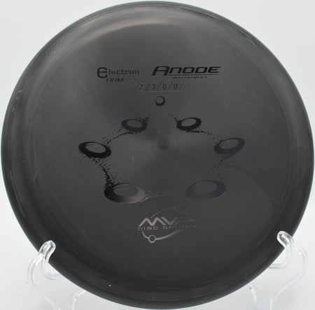 Electron Firm Anode putter resting near chains after a glidey upshot at Z-Boaz Park Disc Golf Course in Fort Worth, Texas