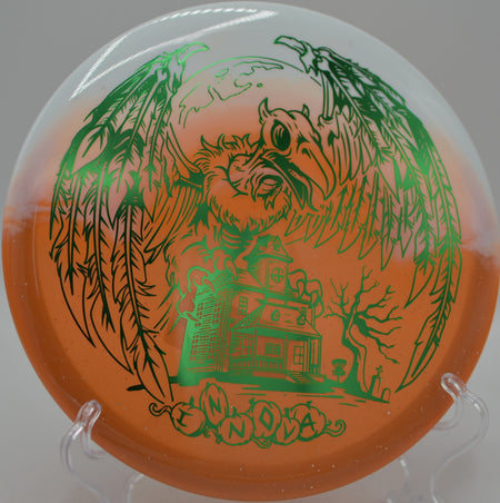 Innova Halloween Duo Roc3 parked circle one on a controlled shot at North Cove Disc Golf Course in Marion, North Carolina.