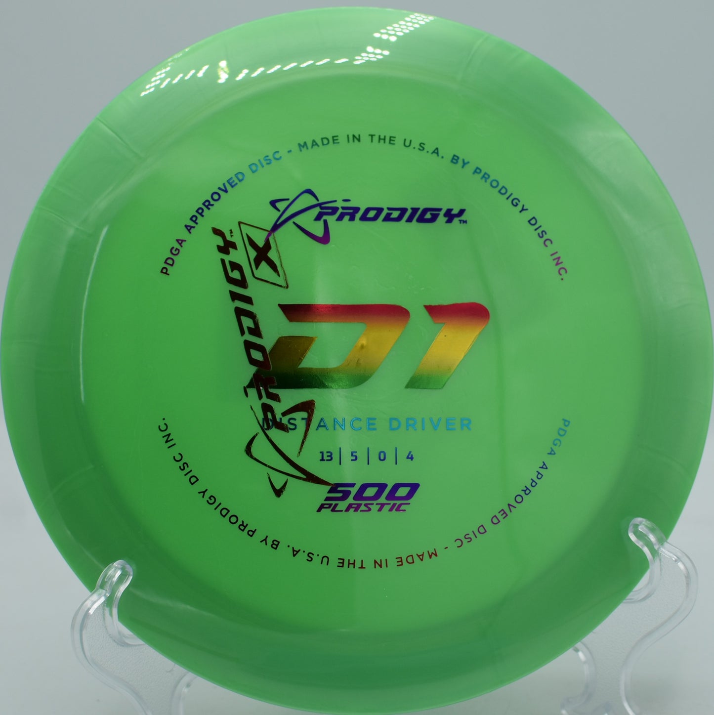 Overstable Prodigy D1 500 F2 carving a skip shot around a dogleg at Smugglers' Notch Disc Golf Course in Jeffersonville, Vermont.