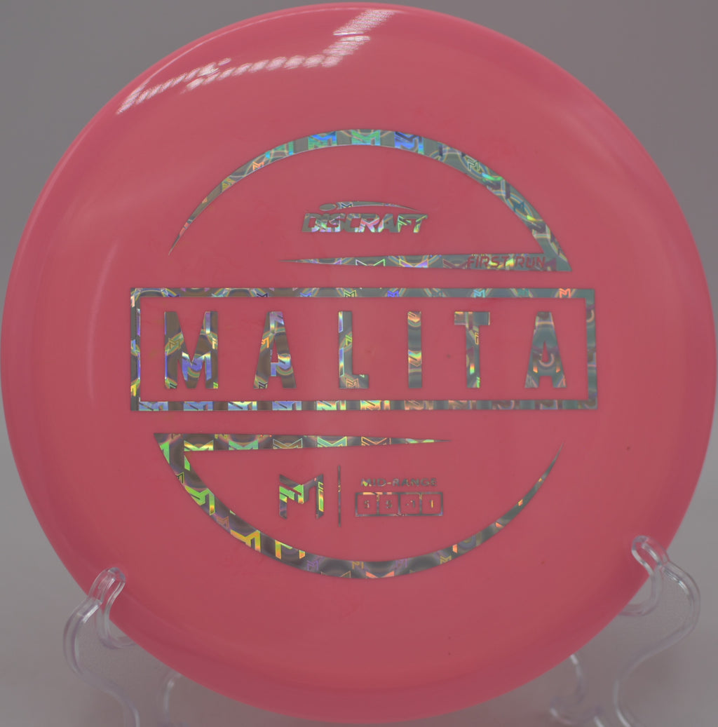 McBeth First Run Malita flying with soft fade through wooded fairways at Stafford Lake Disc Golf Course in Novato, California.