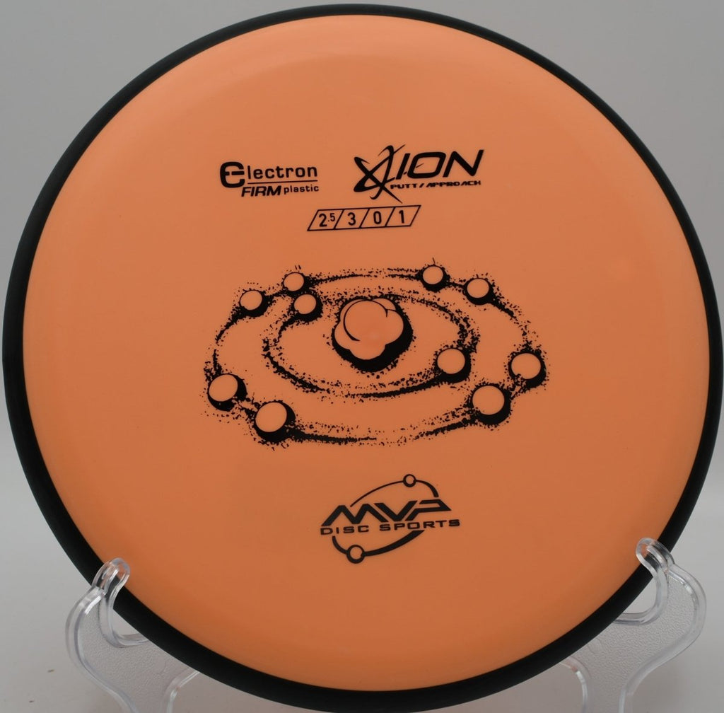MVP Electron Firm Ion putter staged for a spin putt on the green at Hap McLean Park Disc Golf Course in Fort Walton Beach, Florida