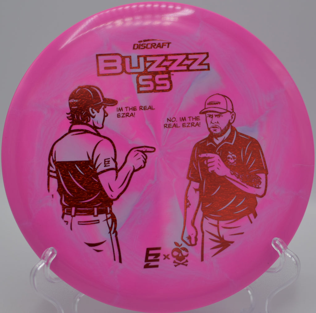 ESP Buzzz SS collaboration disc spinning flat down the fairway at Milo McIver State Park Disc Golf Course in Estacada, Oregon.