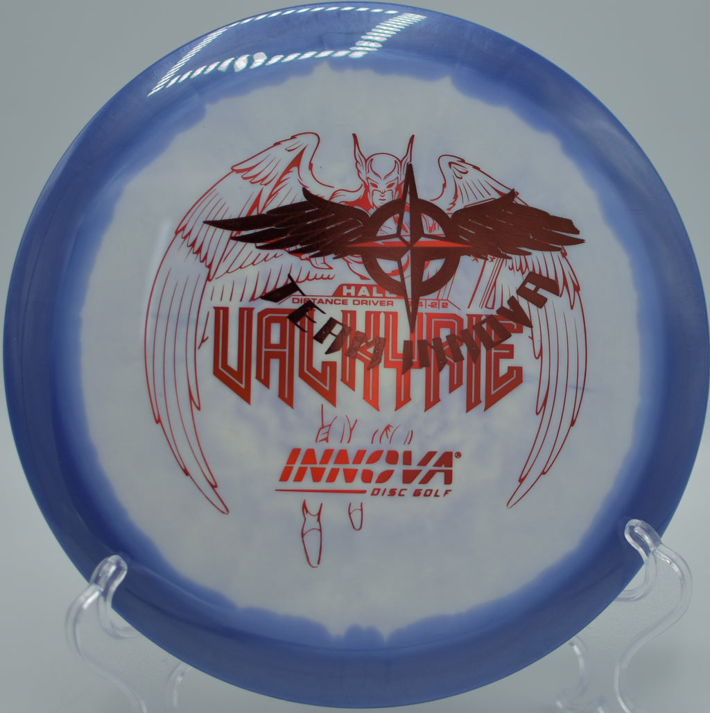 Player throwing a Halo Star Valkyrie Team Stamp on a smooth hyzer-flip line at Maple Hill Disc Golf Course in Leicester, Massachusetts.