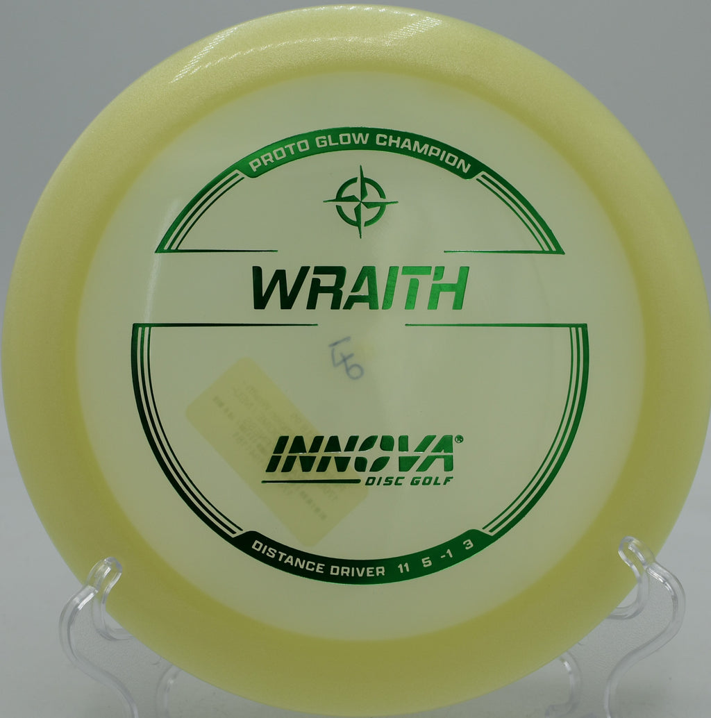 Proto Glow Champion Wraith glowing mid-flight during a night round at Trophy Lakes in Johns Island, SC