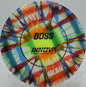 Disc golfer ripping a high-speed I-Dye Champion Boss on a max distance drive at Eagles Crossing in Hawk Point, Missouri