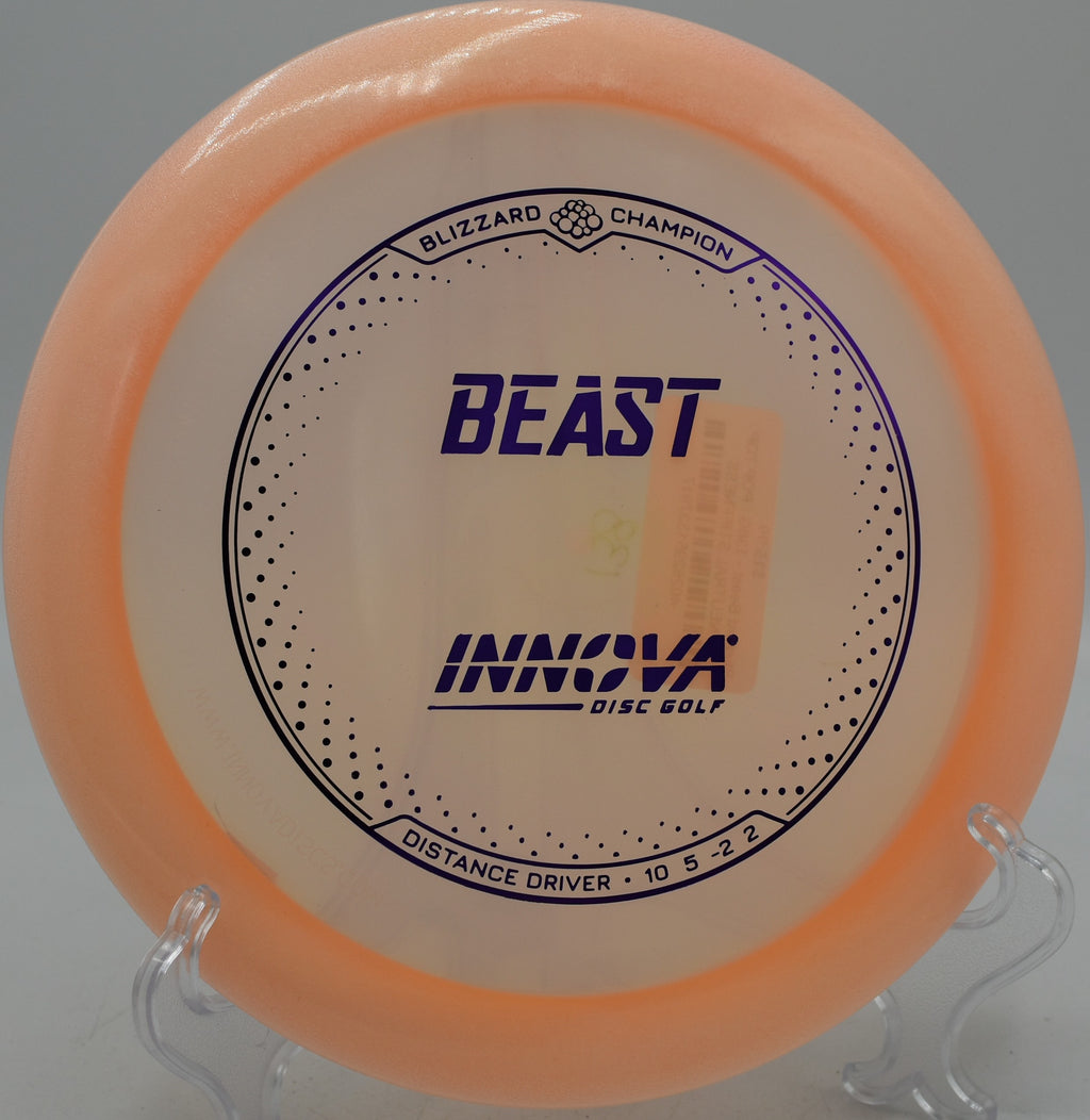 Innova Blizzard Champion Beast disc flying a tailwind distance shot at Blue Ribbon Pines in East Bethel, Minnesota