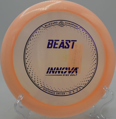 Innova Blizzard Champion Beast disc flying a tailwind distance shot at Blue Ribbon Pines in East Bethel, Minnesota