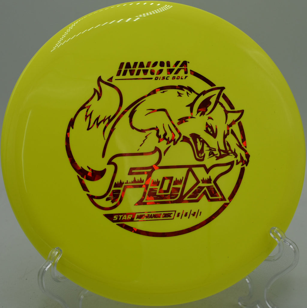 Star Fox Innova midrange parked on a smooth straight line at Maple Hill Disc Golf Course in Leicester, Massachusetts.