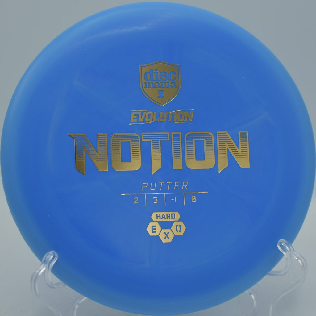 Hard Exo Notion resting on the green after a clean approach at Stafford Lake Disc Golf Course in Novato, California.