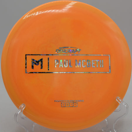 Malita parking near circle edge after steep hyzer at Rockland Lake DGC in New York