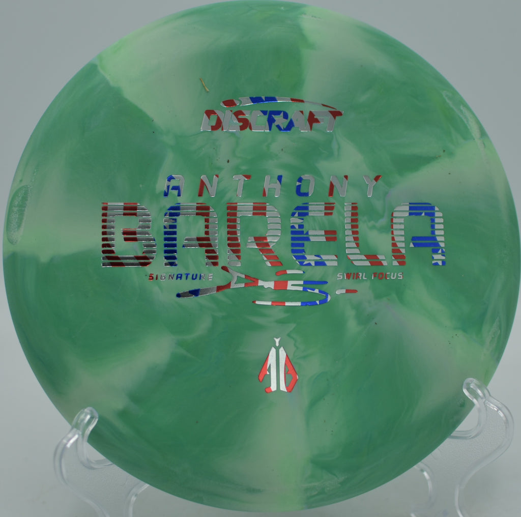 CT Swirl Focus Barela edition flying neutral on approach at Selah Ranch Creekside Disc Golf Course in Talco, Texas.