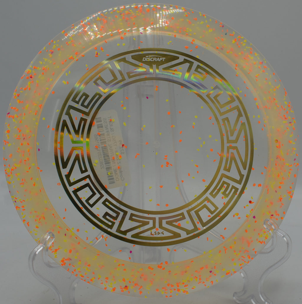 Brightly speckled Confetti Z Zeus disc staged on the tee pad at Lake Marshall Lions Course in Montross, Virginia