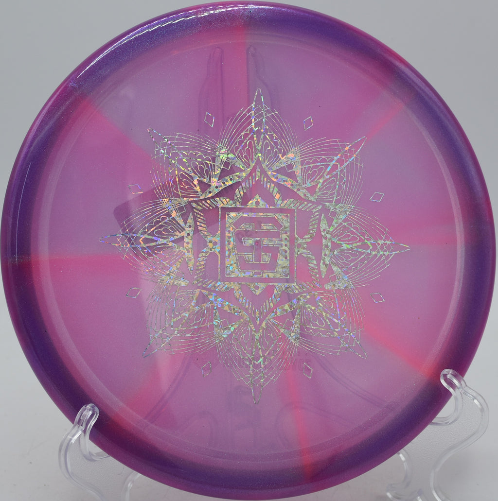 Thought Space Athletics VEX Vessel approach disc floating with late fade at Kensington Toboggan Disc Golf Course in Milford, Michigan.