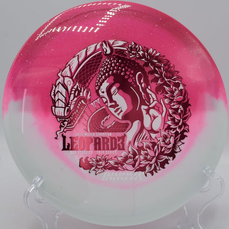 Duo Leopard3 Ohn Scoggins Tour Series fairway driver resting near tee marker at Westminster Park Disc Golf Course in Westminster, Colorado