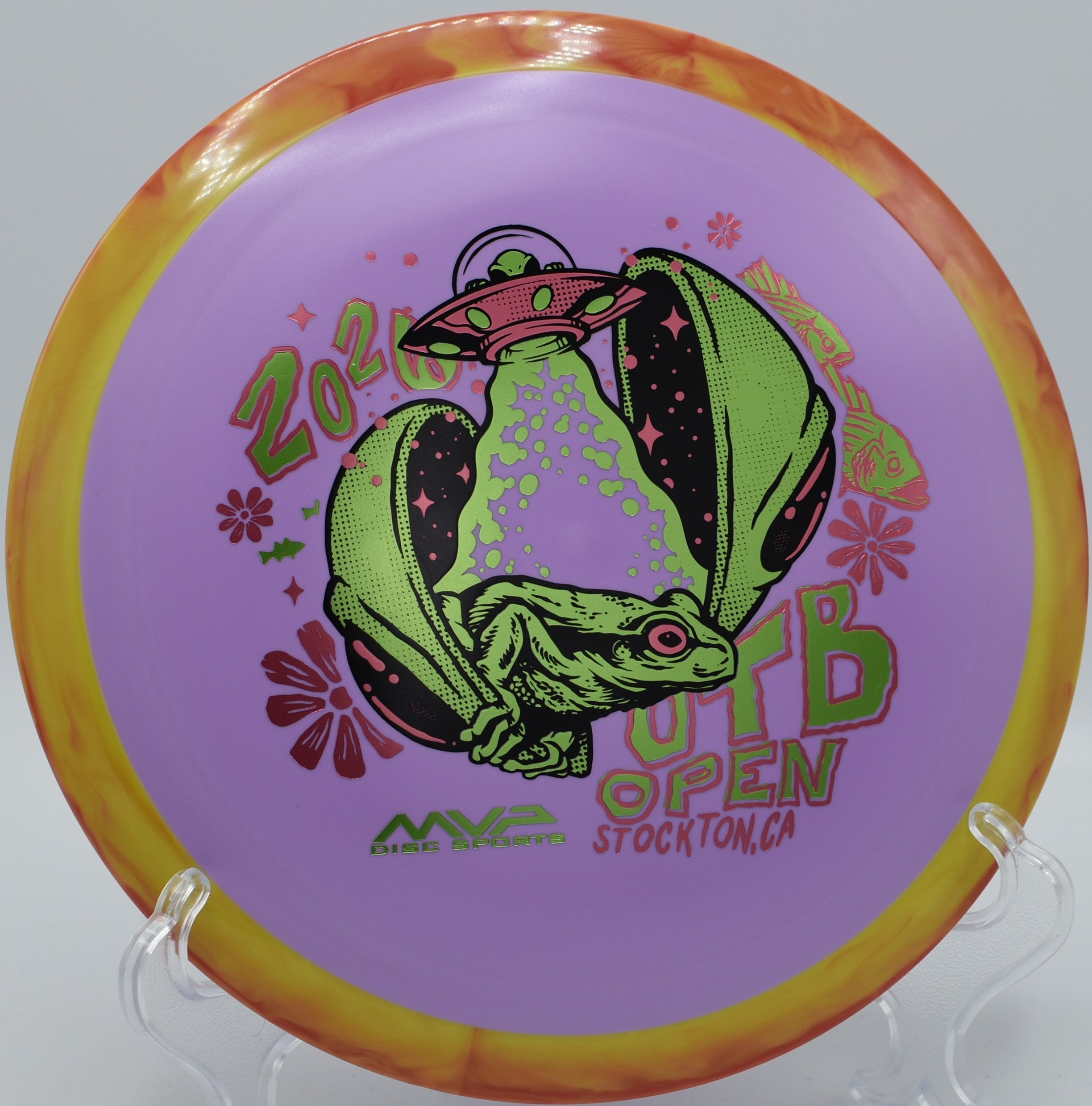 Axiom Delirium Fission OTB Open edition photographed in tall grass at Heritage Park Disc Golf Course in Adrian, Michigan