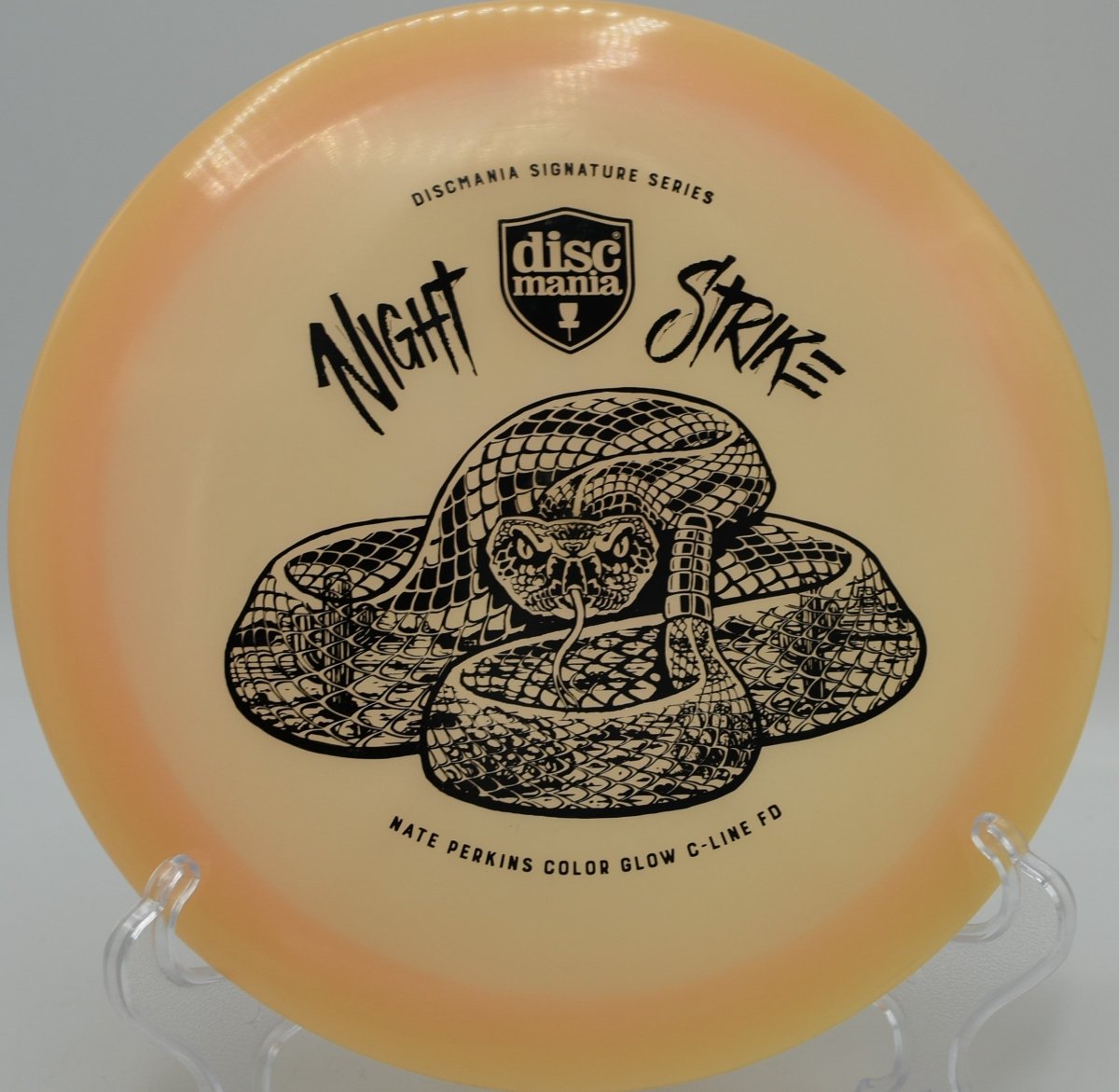 Night Strike Color Glow FD fairway driver glowing on a smooth hyzer-flip at Fountain Hills Disc Golf Course in Fountain Hills, Arizona, highlighting neutral control, effortless glide, and trusted night-golf visibility for precision disc golf fairway shots