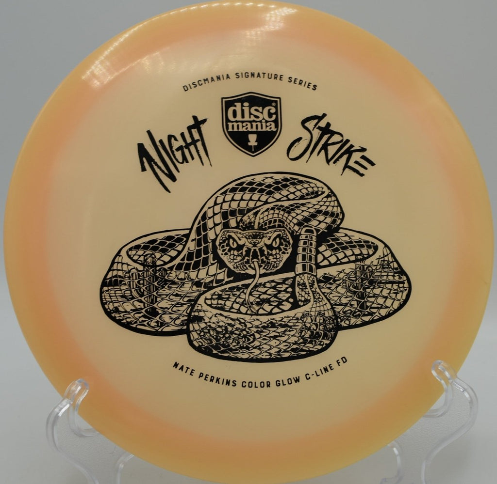 Night Strike Color Glow FD fairway driver glowing on a smooth hyzer-flip at Fountain Hills Disc Golf Course in Fountain Hills, Arizona, highlighting neutral control, effortless glide, and trusted night-golf visibility for precision disc golf fairway shots