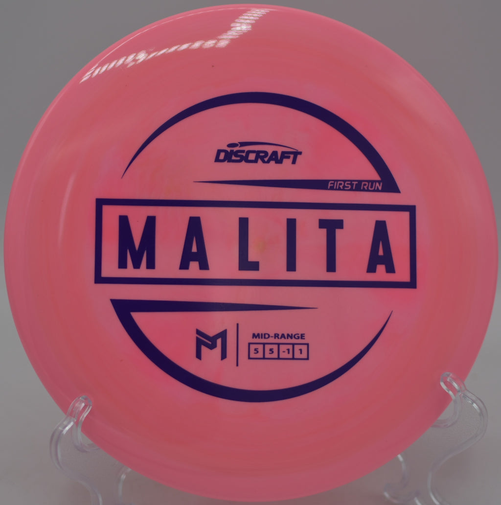 Discraft First Run Malita shaping a technical line through tight trees at Rocklin Disc Golf Course in Rocklin, California.