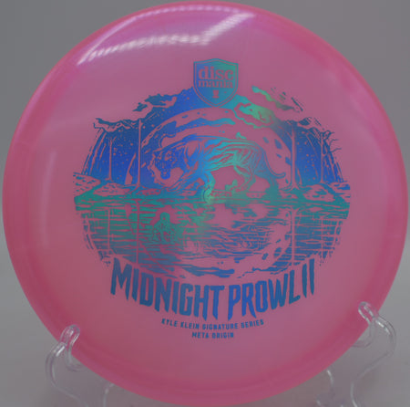 Shimmering Discmania Midnight Prowl 2 Meta Origin thrown flat for precise control at Waterworks Park Disc Golf Course in Kansas City, Missouri.