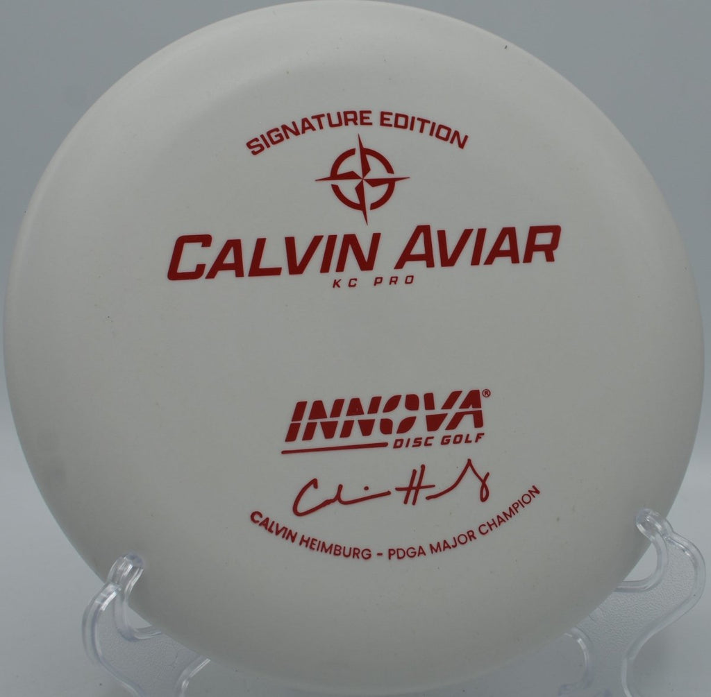 Calvin Heimburg KC Pro Aviar putter positioned for a straddle putt at Northwood Black Disc Golf Course in Morton, Illinois