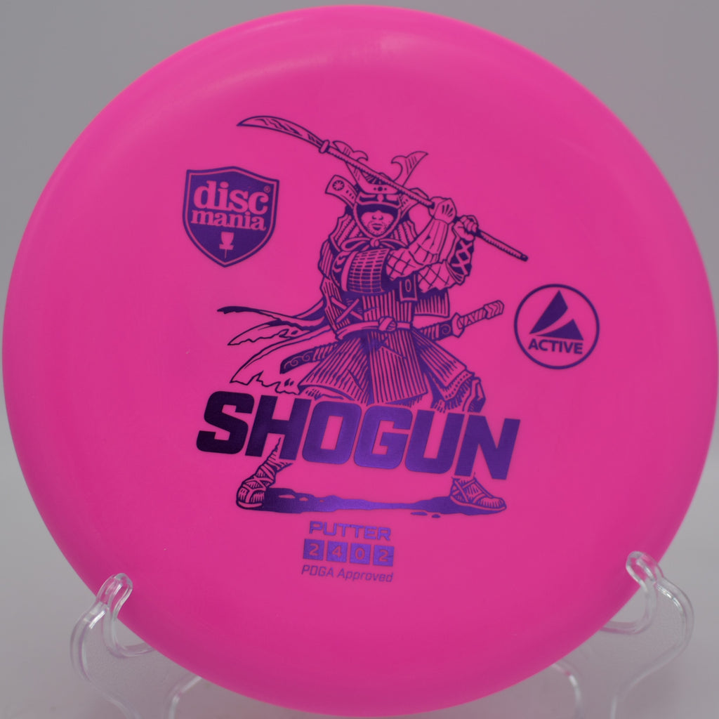 Discmania Active Shogun beaded putter released on a straight putting line at Morley Field Disc Golf Course in San Diego, California.