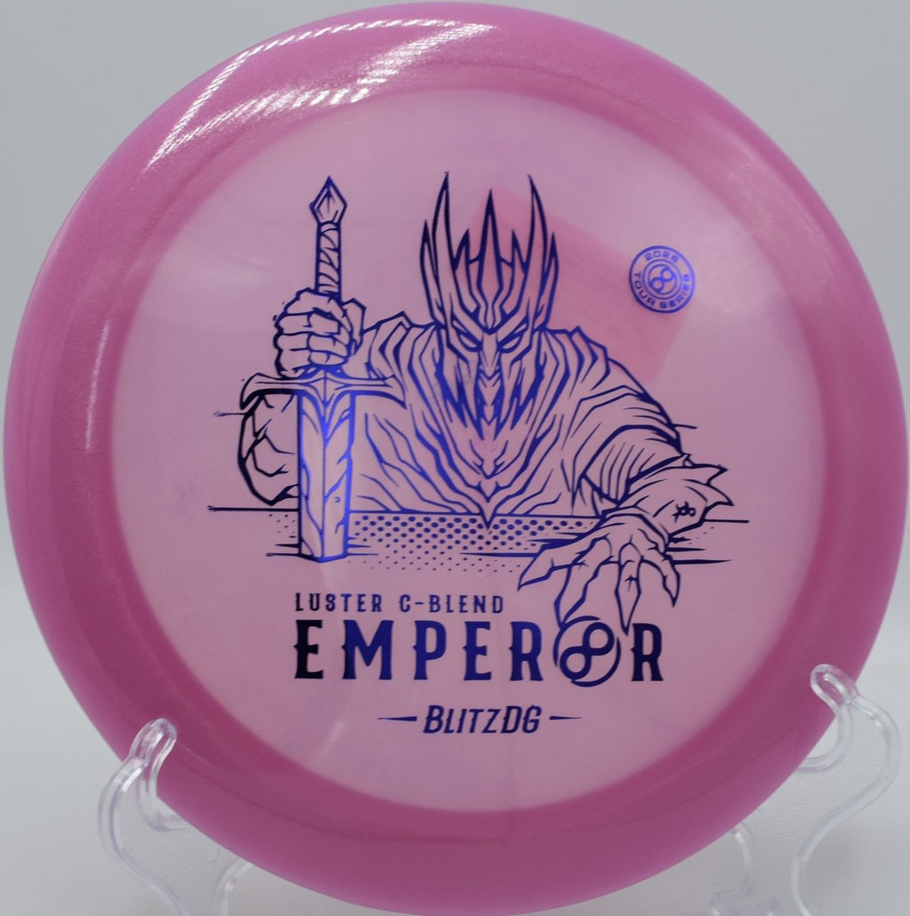 Luster C-Blend Emperor distance driver resting in open fairway after a hyzer release at Fountain Hills Disc Golf Course in Fountain Hills, Arizona