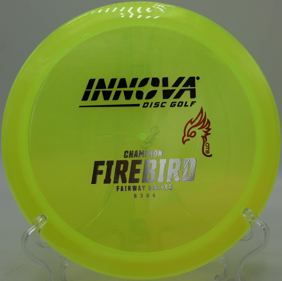 FAF Luster Champion Firebird disc golf driver flying a utility hyzer at Toboggan Disc Golf Course, Milford, Michigan
