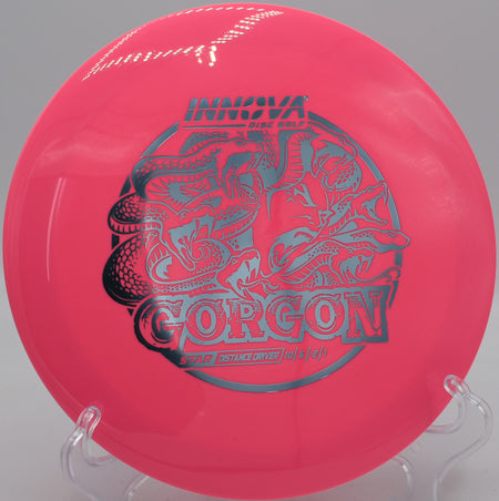 Innova Star Gorgon launching down the fairway at Flip City Disc Golf Park in Shelby, Michigan