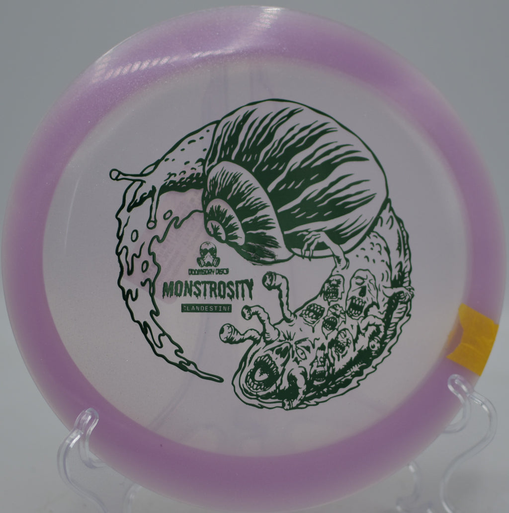 Clandestine Monstrosity by Doomsday Discs carving a wild flight path at DeLaveaga Disc Golf Course in Santa Cruz, California.