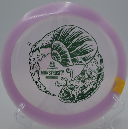 Clandestine Monstrosity by Doomsday Discs carving a wild flight path at DeLaveaga Disc Golf Course in Santa Cruz, California.