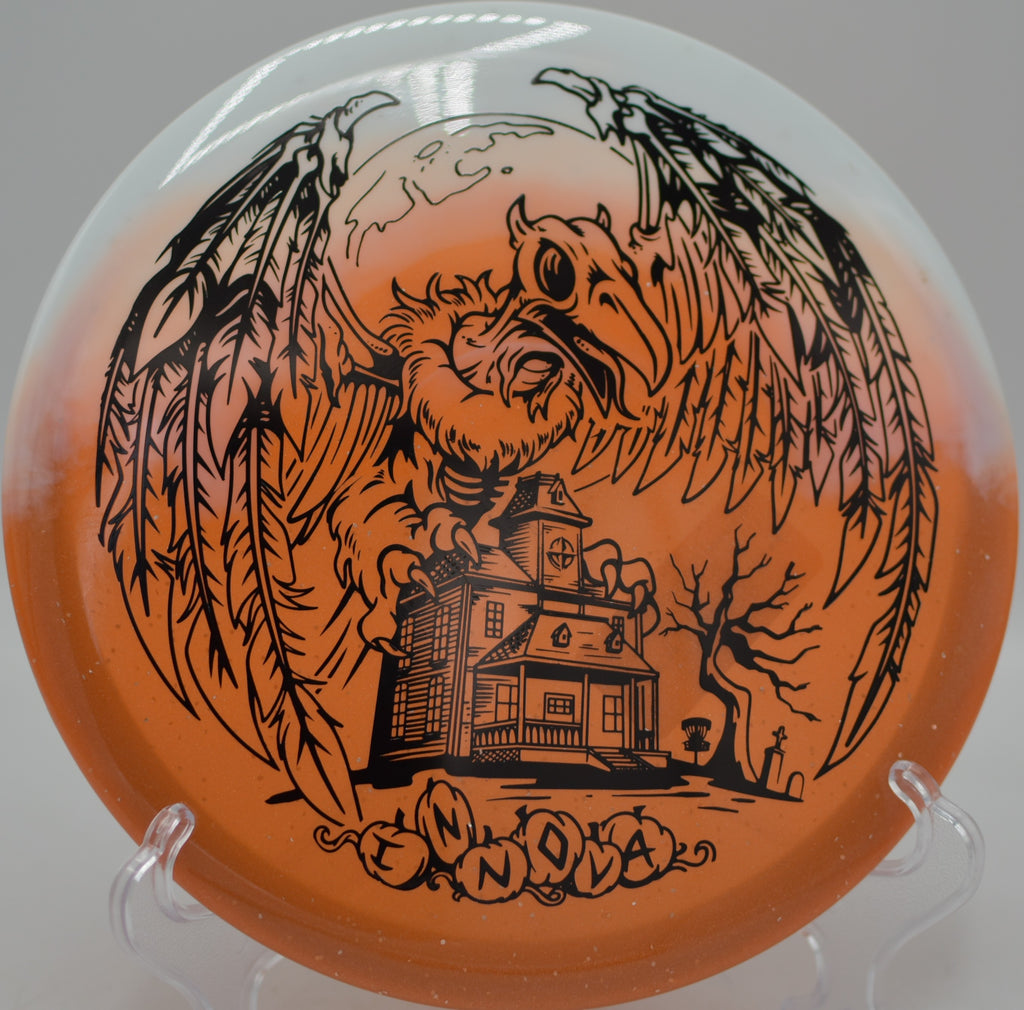 Innova Halloween Duo Roc3 flying point-and-shoot on approach at Moraine State Park Disc Golf Course in Portersville, Pennsylvania.