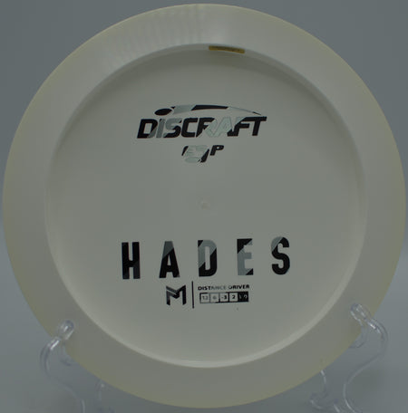 Player launching a full-power ESP Hades drive across mountain air at Highland Glen Disc Golf Course in Bozeman, Montana.