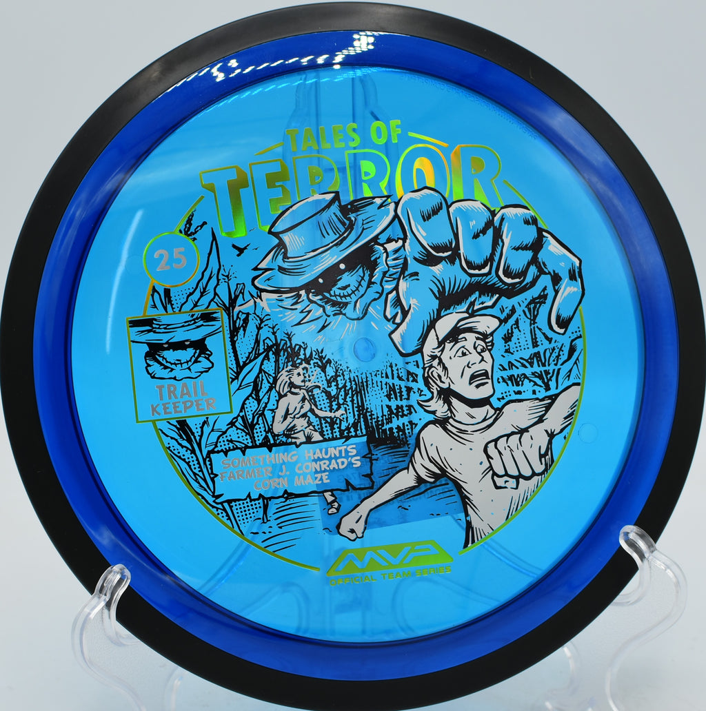 Proton Trail Halloween 2025 disc from MVP flying straight over a scenic valley at Harmon Hills in Tennessee.
