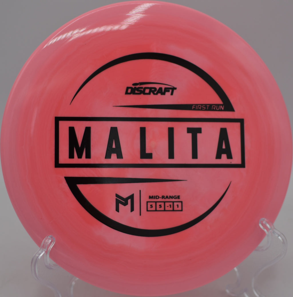 ESP plastic Malita landing softly on the green at Idlewild Disc Golf Course in Burlington, Kentucky.
