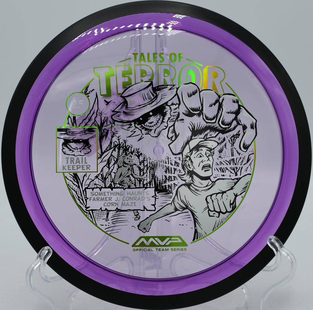 MVP Proton Trail Halloween 2025 edition disc photographed near tee pad 3 at Winthrop Gold, Rock Hill SC, showing its smooth turning flight for technical fairway drives.
