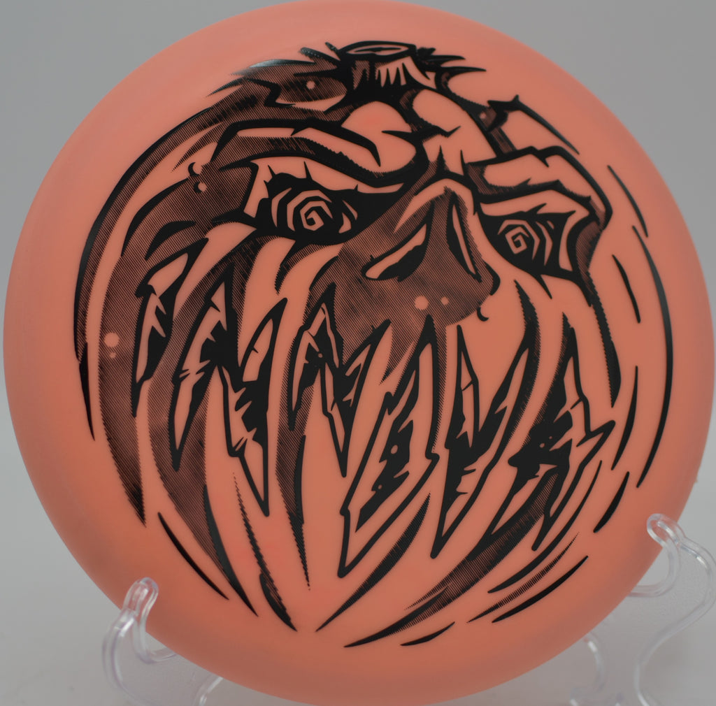 Innova Nexus Proto Glow Halloween Aviar floating into the chains at Moraine State Park Disc Golf Course in Portersville, Pennsylvania.