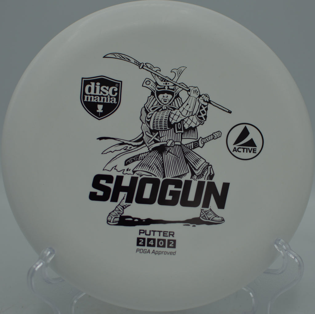Firm grip on the Discmania Active Shogun during an approach shot at Maple Hill Disc Golf Course in Leicester, Massachusetts.