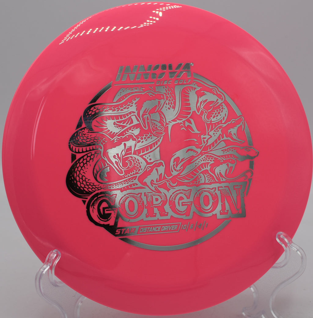 Star Gorgon disc flying a straight-to-fade line at Hornets Nest Disc Golf Course in Charlotte, North Carolina