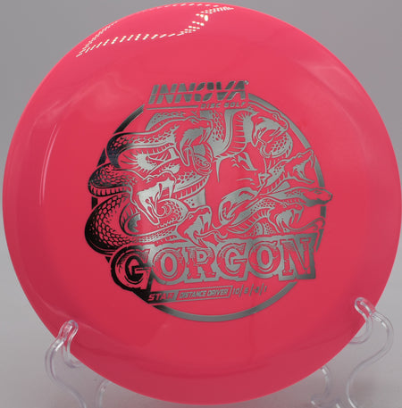 Star Gorgon disc flying a straight-to-fade line at Hornets Nest Disc Golf Course in Charlotte, North Carolina