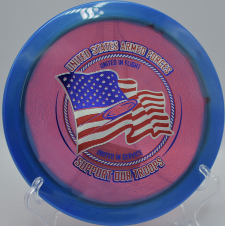 Innova Halo Champion Firebird Support Our Troops stamp photographed on the fairway at Gateway Park DGC in Fort Worth, TX, highlighting its dependable 0 turn and 4 fade.