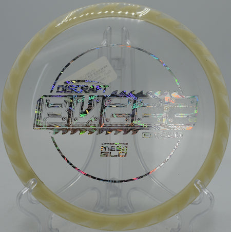 Discraft BuzzzSaw midrange in CryZtal FLX plastic glowing in flight at North Boundary Park, PA