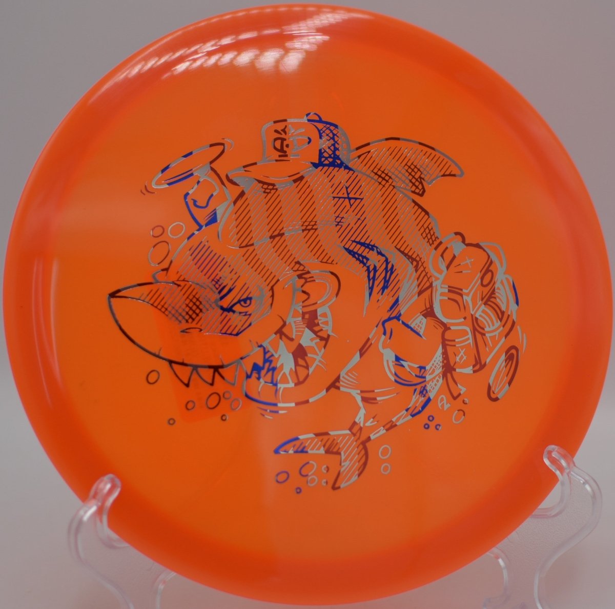 Fluid Justice Caddyshark midrange disc golf disc for Olympia courses with reliable fade nationwide