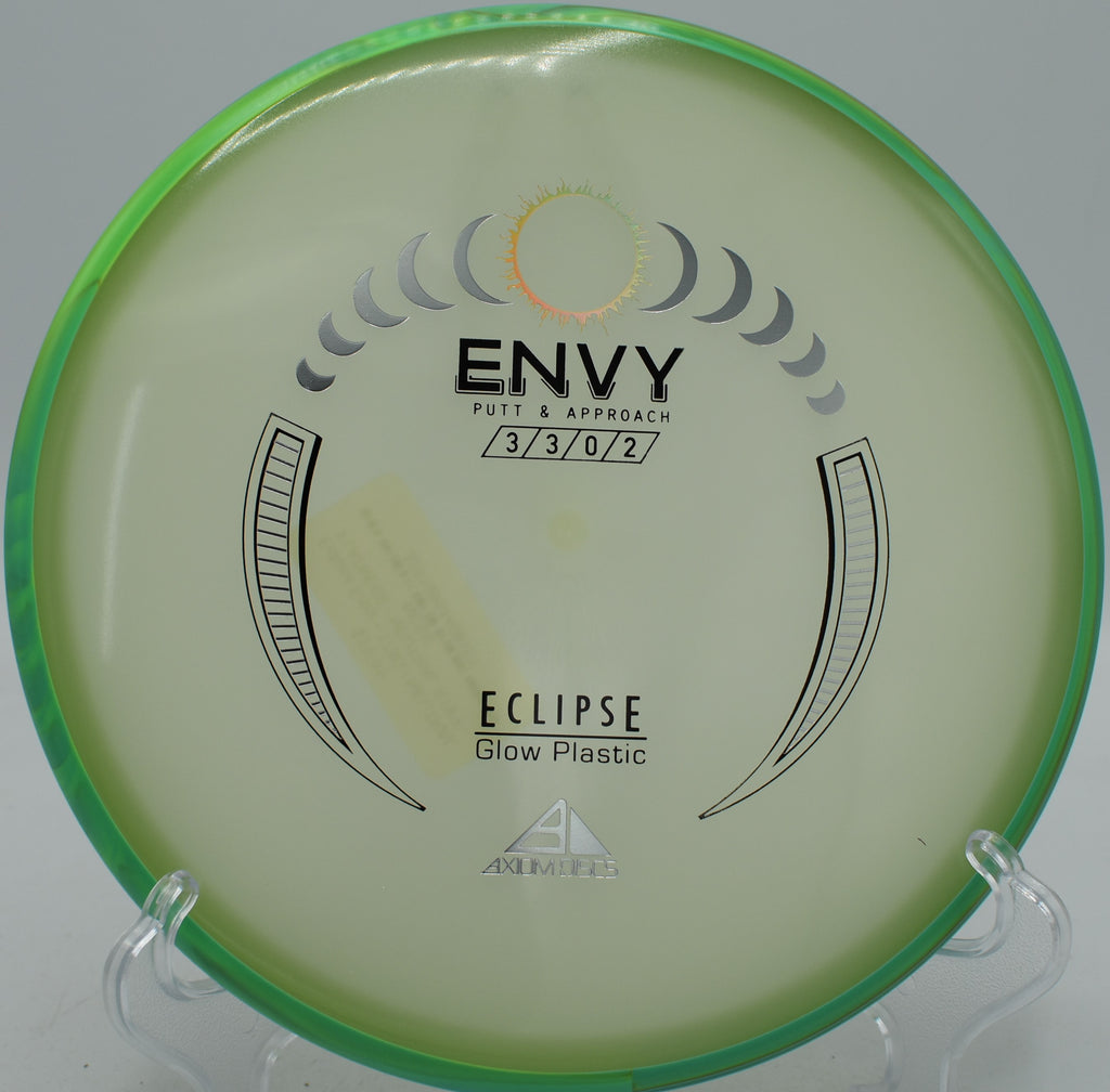 Eclipse Envy MVP glowing plastic disc parking on a short hyzer at Blue Ribbon Pines Disc Golf Course in East Bethel, Minnesota.