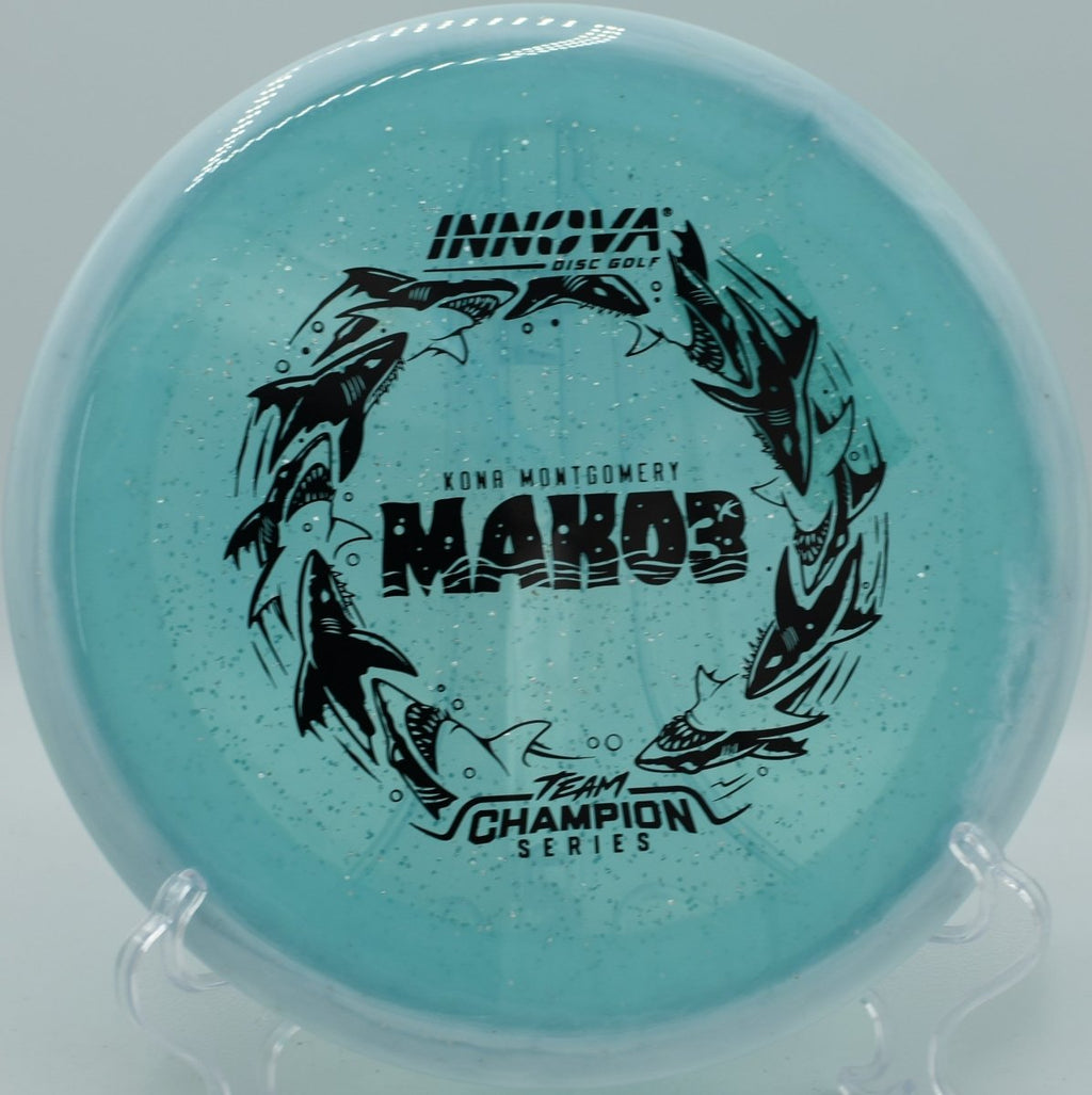 Innova Halo Champion Metal Flake Mako3 disc golf midrange flying straight at Selah Ranch Disc Golf Course in Talco Texas
