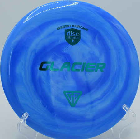 Discmania Creator Series Glacier disc flying a controlled flex shot at Idlewild Disc Golf Course in Burlington, Kentucky