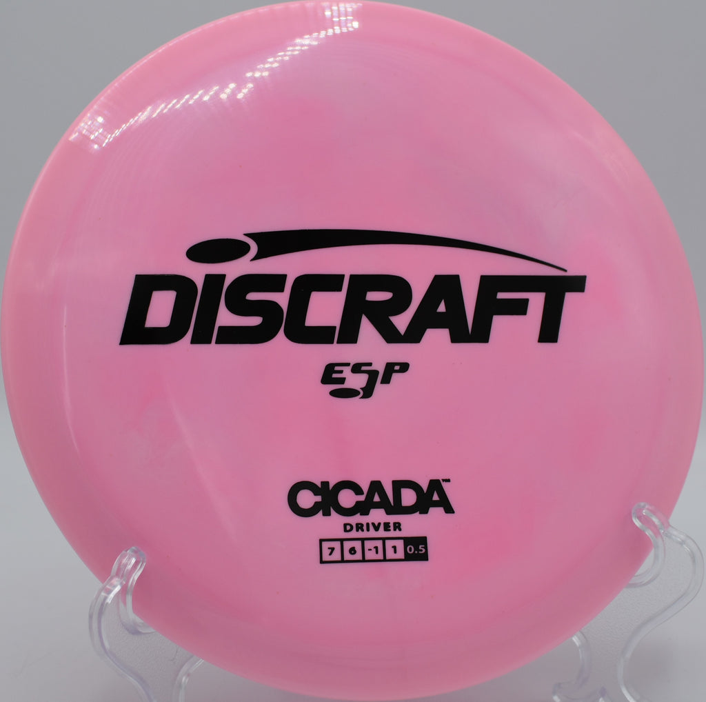 Discraft ESP Cicada floating down a tree-lined hill at Walnut Creek Park in Charlottesville, Virginia.

