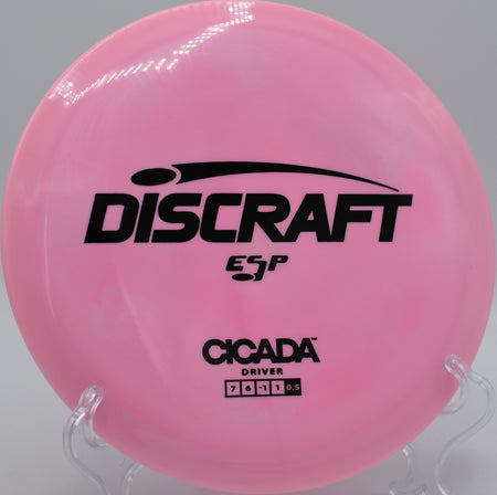 Discraft ESP Cicada floating down a tree-lined hill at Walnut Creek Park in Charlottesville, Virginia.

